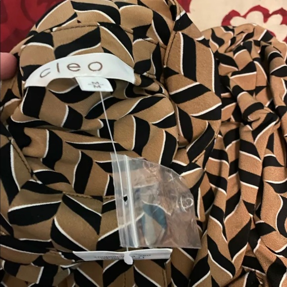 selling this blouse from Cleo’s. it’s perfect if you want to look professionally - Picture 2 of 3